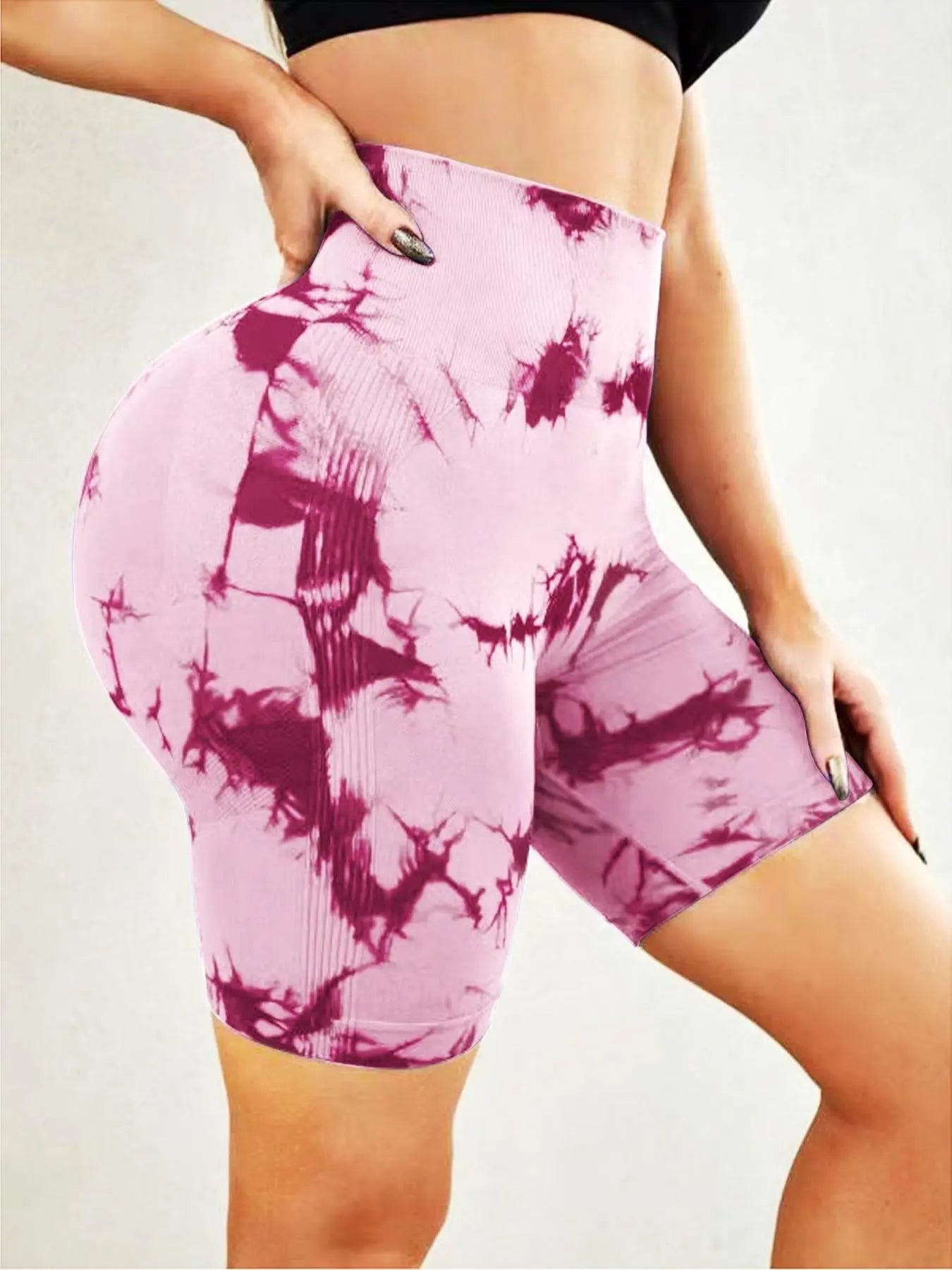 Upgrade your activewear with our Women’s Seamless Tie-Dye High-Waist Sports Shorts, featuring a stylish print, supportive compression, and a versatile fit perfect for yoga, gym, running, and summer outings.