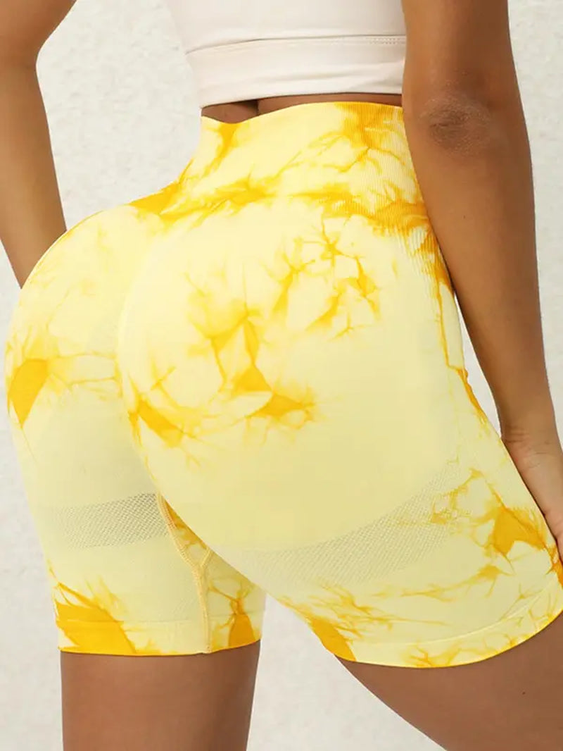 Upgrade your activewear with our Women’s Seamless Tie-Dye High-Waist Sports Shorts, featuring a stylish print, supportive compression, and a versatile fit perfect for yoga, gym, running, and summer outings.