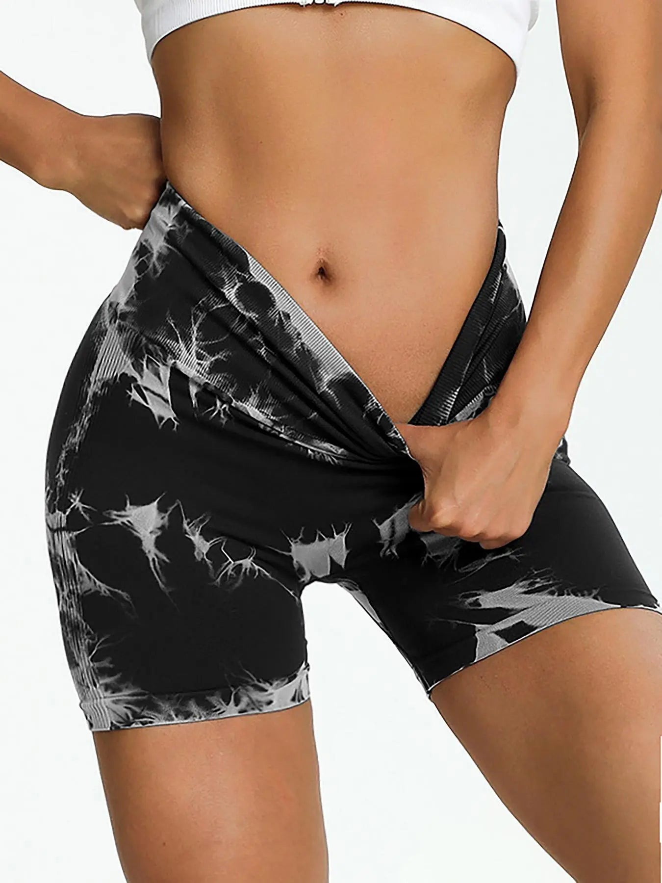 Upgrade your activewear with our Women’s Seamless Tie-Dye High-Waist Sports Shorts, featuring a stylish print, supportive compression, and a versatile fit perfect for yoga, gym, running, and summer outings.